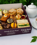 Afternoon tea box with sandwiches, cakes and scones from Hannah’s Kitchen Cork.