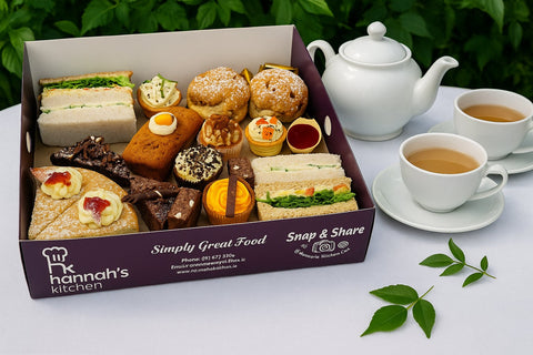 Afternoon tea box with sandwiches, cakes and scones from Hannah’s Kitchen Cork.