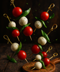 Caprese skewers with cherry tomatoes, mozzarella balls, and fresh basil leaves. Handmade by Hannah’s Kitchen Cork