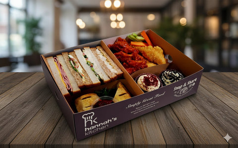 Evening tea box with sandwiches, chicken wings, cupcakes and treats from Hannah’s Kitchen Cork.