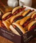 Box of full Irish breakfast rolls with sausages, bacon and pudding from Hannah’s Kitchen Cork.