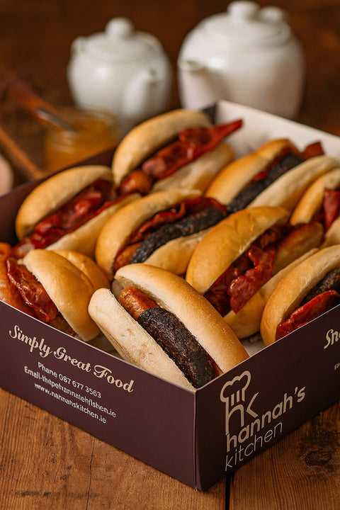 Box of full Irish breakfast rolls with sausages, bacon and pudding from Hannah’s Kitchen Cork.