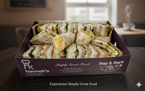 Classic sandwich platter with mixed fillings in Hannah’s Kitchen Cork branded box.