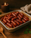 Cocktail sausages with sesame seeds in catering tray from Hannah’s Kitchen Cork.