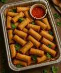 Crispy spring rolls with sweet chilli dip in foil catering tray from Hannah’s Kitchen Cork.
