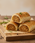 Hannah's Kitchen Vegan Sausage Rolls – plant-based filling of soya bean, yellow split peas, mushrooms, and roasted garlic wrapped in flaky puff pastry, seasoned with parsley, oregano, thyme, and rosemary – catering Cork