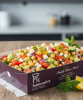 Mediterranean chickpea and feta salad with cucumber, tomato, onion, and mint, served in Hannah’s Kitchen catering tray – healthy catering option in Cork