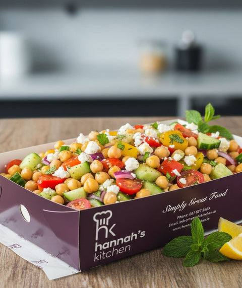 Mediterranean chickpea and feta salad with cucumber, tomato, onion, and mint, served in Hannah’s Kitchen catering tray – healthy catering option in Cork