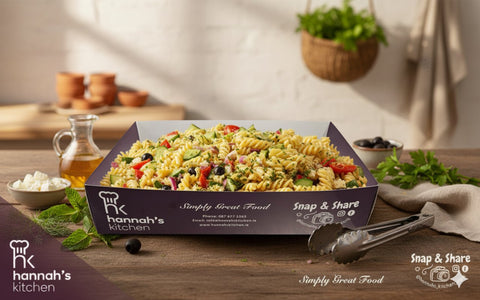 Mediterranean pasta salad with feta, olives, cucumber, and fresh herbs, served in Hannah’s Kitchen branded catering box – Cork catering salads