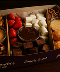 Luxury dessert box with fresh strawberries, brownies, profiteroles, waffles, marshmallows, and dipping sauces. Handmade by Hannah’s Kitchen Cork